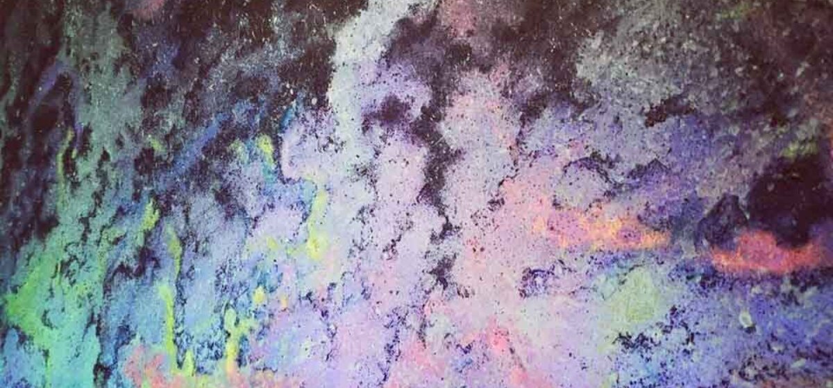 A contemporary painting that has a cloud-like formation consisting of the following colours: pink, green, purple, blue, black and more.