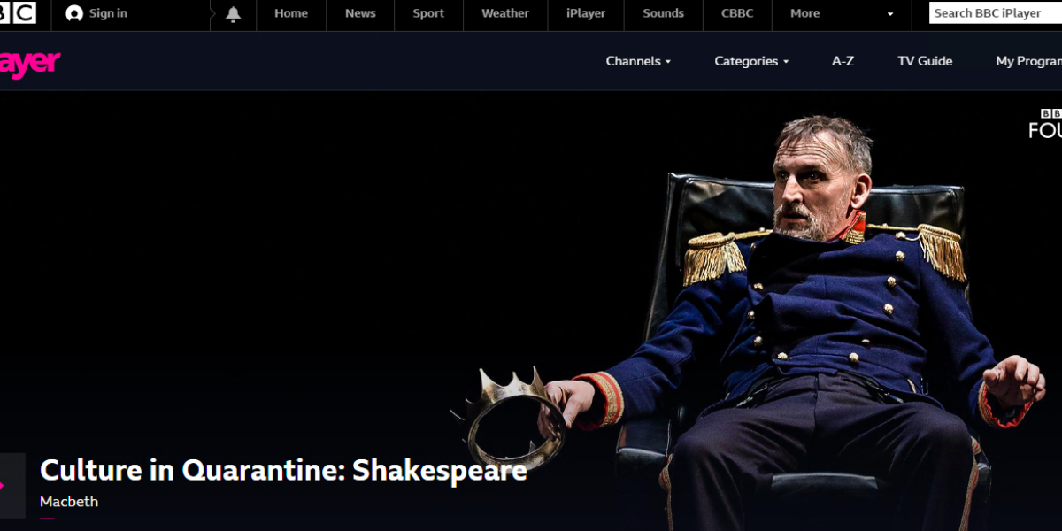 A screenshot of BBC iPlayer with the text 'Culture in Quarantine: Shakespeare' in the bottom left corner next to a play buttom and an image of a male actor in regal clothing sat in a chair and holding a crown in his right hand.