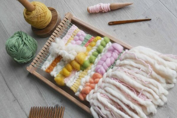 A multi-coloured weaving on a loom