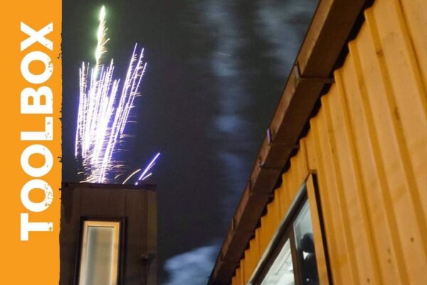 Exterior of 101 with a firework.