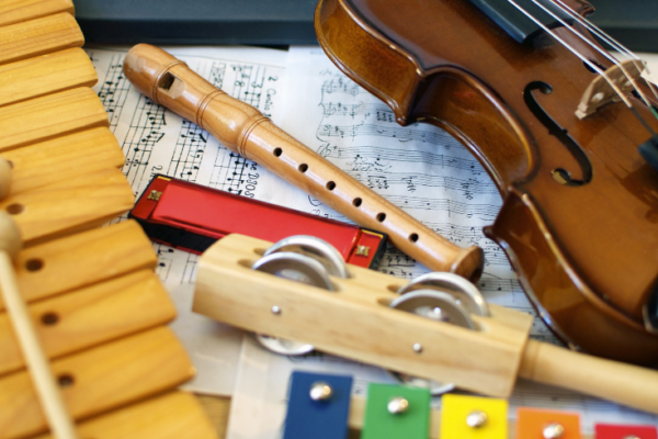A photo of several instruments including a Xylophone, Flute and Violin.